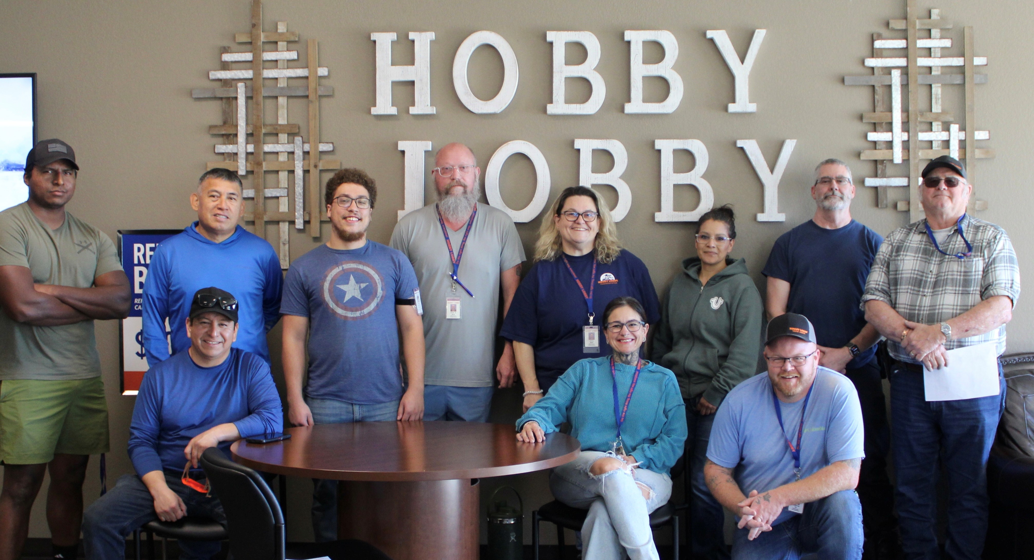 A group of Hobby Lobby truck drivers smiling